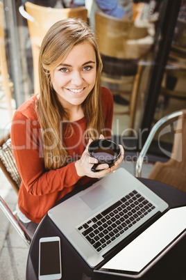 Woman using her laptop