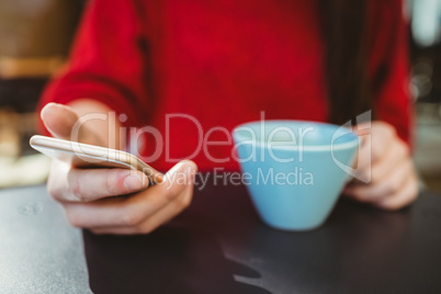 Woman using her smartphone