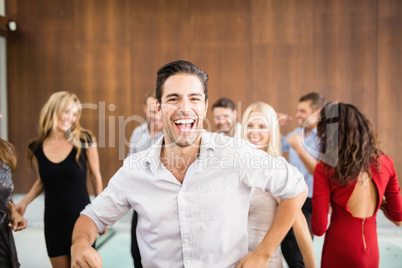 Group of young friends dancing