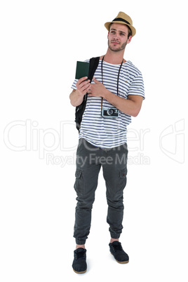 Smiling handsome man holding a leather wallet