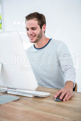 Handsome man working on computer