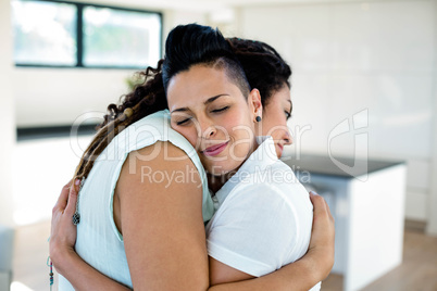 Lesbian couple embracing each other