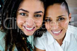 Portrait of happy lesbian couple