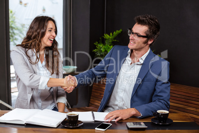 People giving handshake