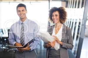 Businesspeople with document and organizer