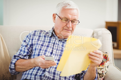 Senior man looking at a document