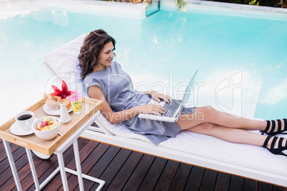 Young woman using laptop