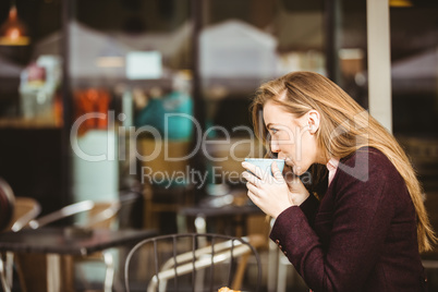 Woman drinking a cup of coffee