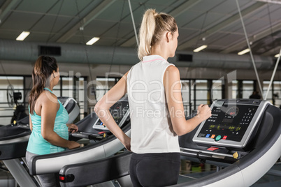 Women exercising on a treadmill