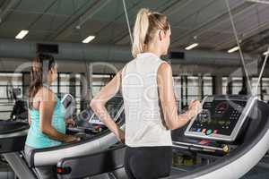 Women exercising on a treadmill