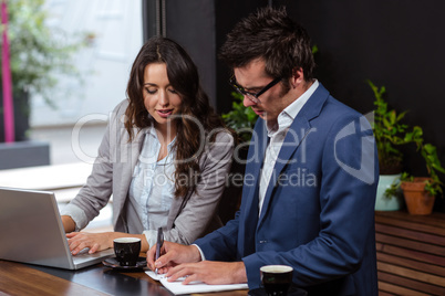 Business people working with laptop and coffee
