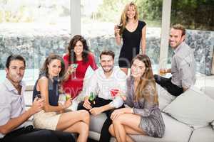 Group of friends having cocktail drinks