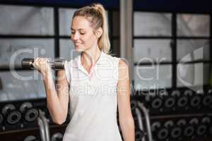 Woman exercising with dumbbells