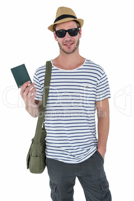 Smiling handsome man holding a leather wallet