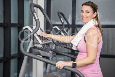 Pregnant woman on crosstrainer