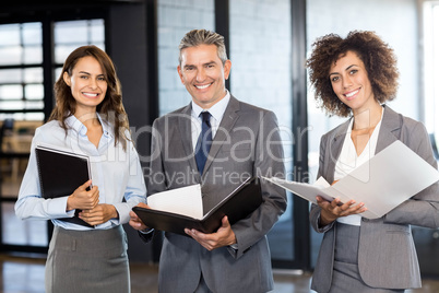 Business team with document and organizer