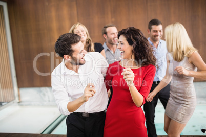 Group of young friends dancing