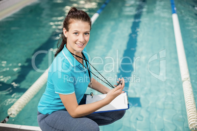 Trainer woman holding a stopwatch