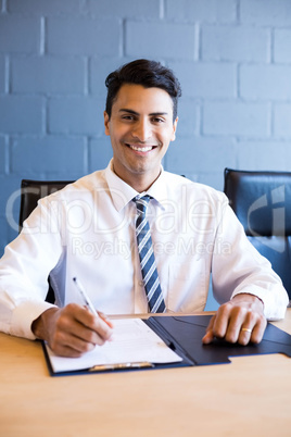 Young businessman in business meeting