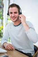 Handsome man working with headset