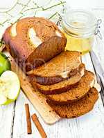 Bread apple with cinnamon on light board