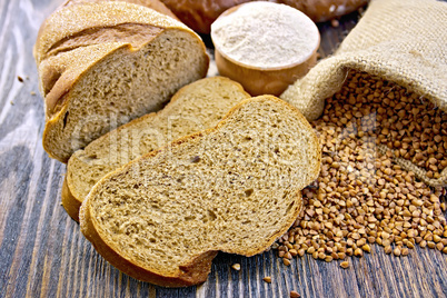Bread buckwheat with cereals and flour on board