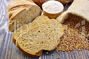 Bread buckwheat with cereals and flour on board