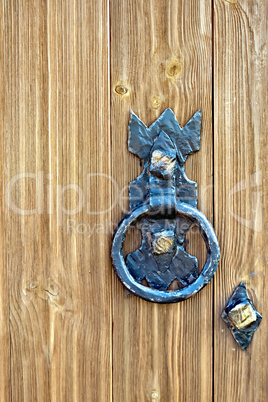 Door wooden with forged handle