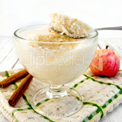 Jelly airy apple in glass bowl on light board