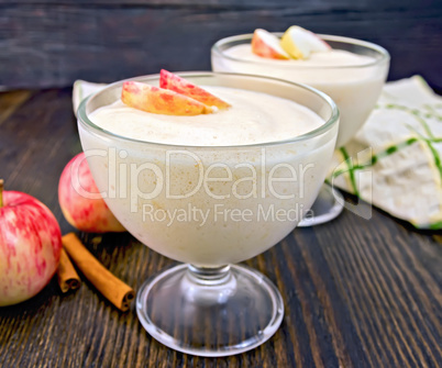 Jelly airy apple in glass bowl with cinnamon on board