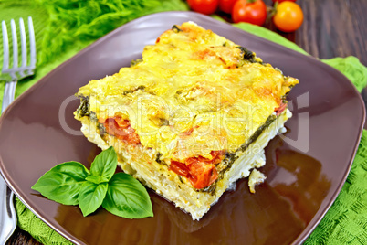 Pie potato with tomato and basil on board
