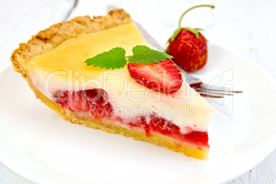 Pie strawberry with sour cream on light  board