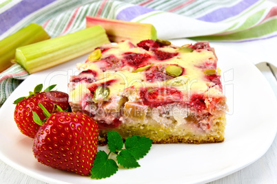 Pie strawberry-rhubarb with sour cream and napkin on board