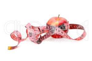 apple and measuring tape isolated on white background