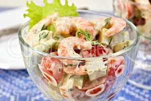 Salad with shrimp and tomatoes in glass