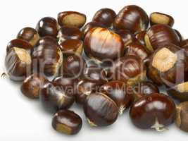 fresh chestnuts over white