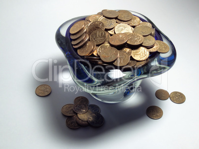 Vase of trifle, beautiful shadow, scattered coins