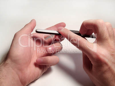 grooming of nails on a man's hand