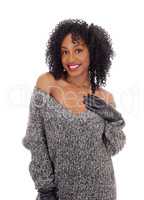African American woman in gray sweater.