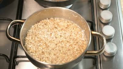 Barley porridge cooked in the pan