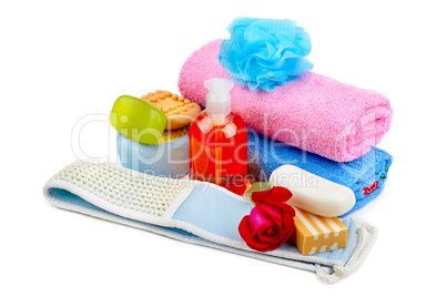 towels, soap and sponges isolated on white background