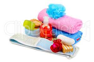towels, soap and sponges isolated on white background