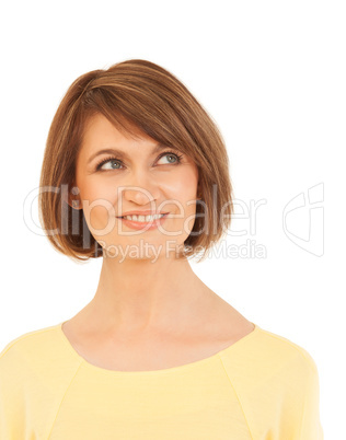 Elegant adult woman looking up and smiling