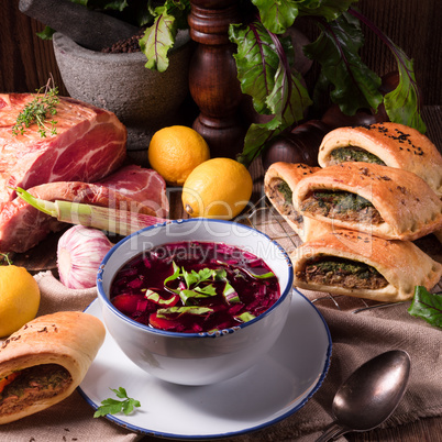 beet green soup with pastries