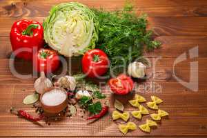 Vegetables and seasonings with on a vintage wooden table