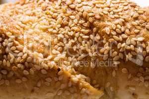 Loaf with sesame seeds background