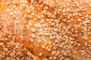 Loaf with sesame seeds background