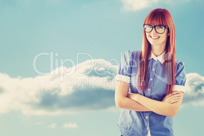 Composite image of attractive hipster woman with crossed arms