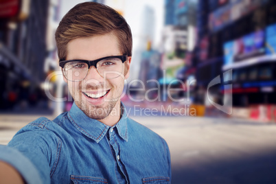 Composite image of portrait of happy man wearing eye glasses