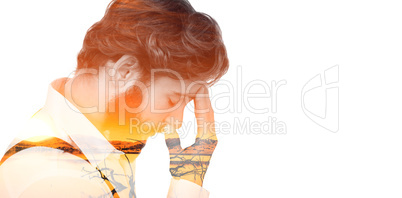 Composite image of frustrated hipster with head in hand
